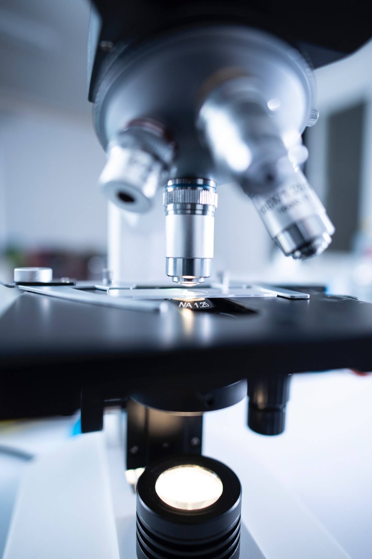 shallow-focus-photography-of-microscope-op